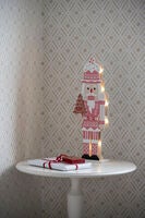 Nötknäppare rosa LED batteri