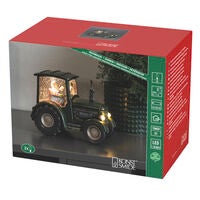 Vattenfylld traktor med man