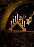 Elljusstake 7 lj trä röd