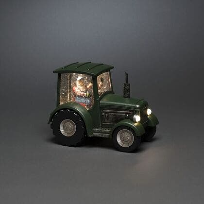 Vattenfylld traktor med man
