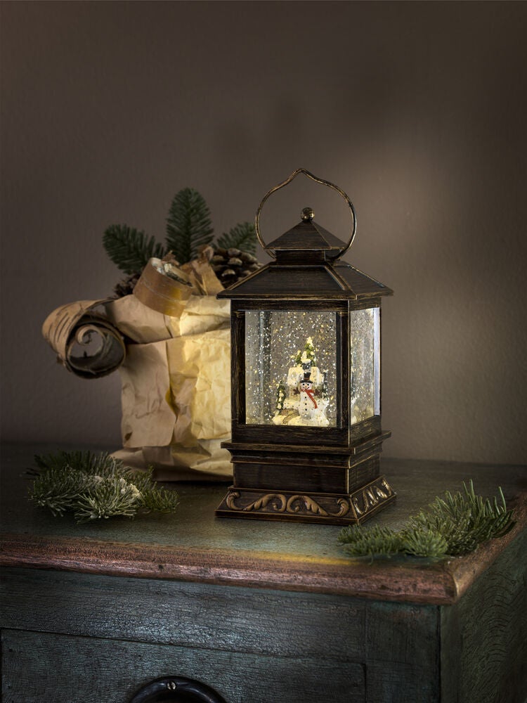 Vattenfylld minilykta snögubbe